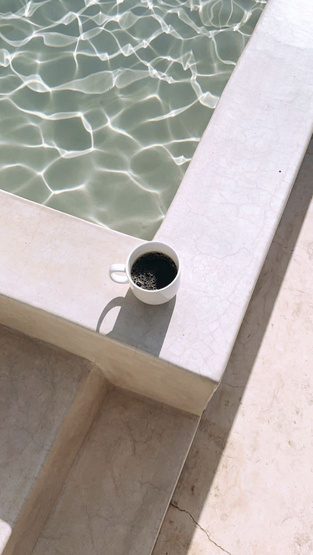 Aesthetic beige pool and coffee